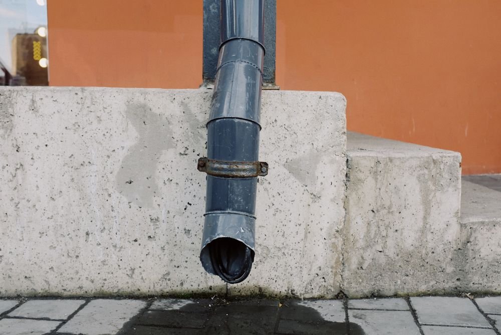 Water draining from a pipe